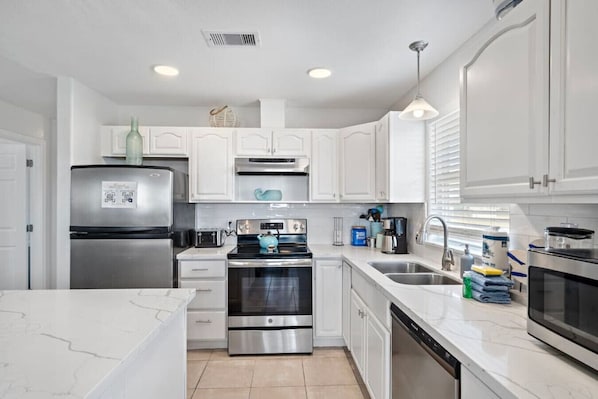Whip up delicious meals in this charming kitchen