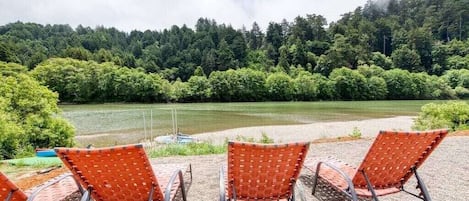 lounge chairs for sun bathing and view of private beach