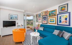 sitting room with the balcony and view to ruin of 15th century old castle