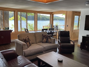 View from couch with windows overlooking the lake