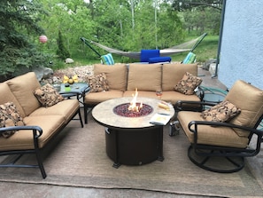 Back patio with fire pit.  Great place to read.
