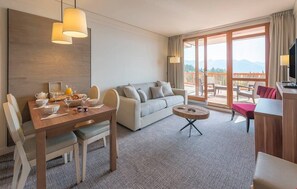 Relax on the sofa that doubles as a bed. Views will vary.