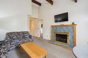 Get toasty and warm next to the electric fireplace.