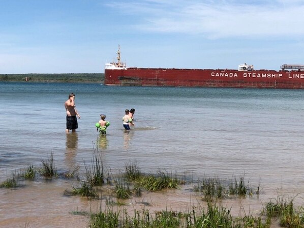 Your own private, sandy beach!  One of the few properties with shallow water.