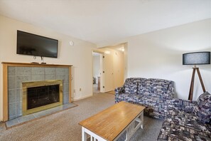 Get toasty and warm next to the electric fireplace.