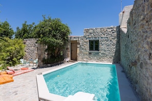 Lay by the pool and enjoy the calmness of the village