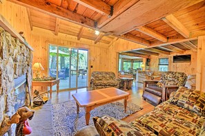 Up to 7 guests can enjoy the cozy cabin accommodations.