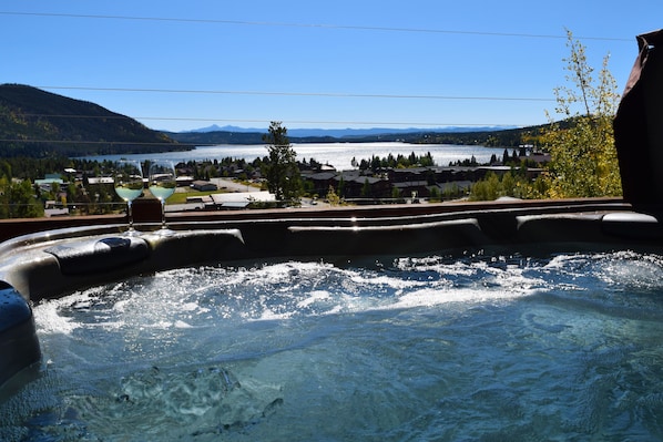 View from lower deck hot tub of Shadow Mtn Lake and mountains by Winter Park