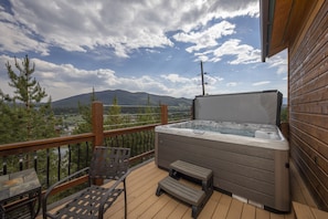 Large private 92x92 VitaSpa hot tub with seating for 6-7 and fabulous views