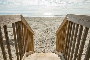 Take the stairs from the parking garage onto the immaculate, sandy beach. 