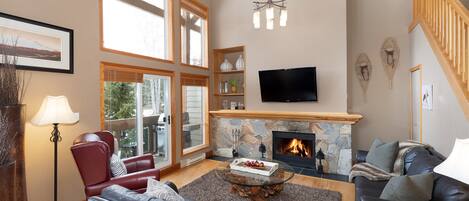 Living area has vaulted ceilings which give an abundance of natural light