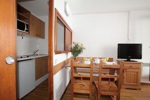 Reconnect with loved ones over a meal at the dining table.