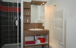 Prepare for your day outside in the spacious bathroom.