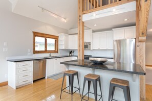 Upgraded modern kitchen with breakfast bar