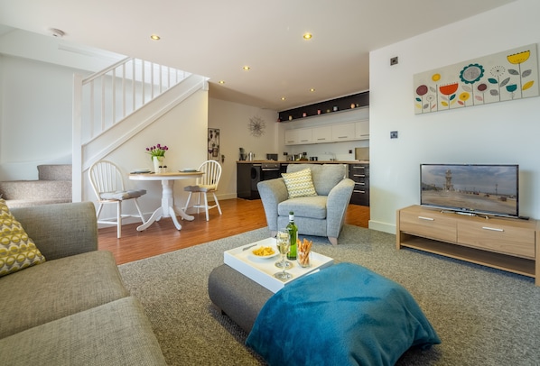 Ground floor: The spacious interior at Beau View Cottage and stairway up to the bedroom