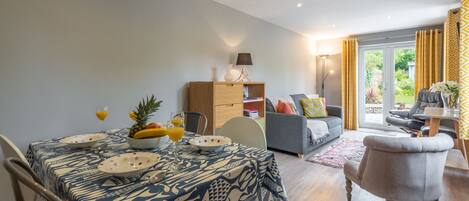 Basil Cottage: Open plan dining area through to the sitting room