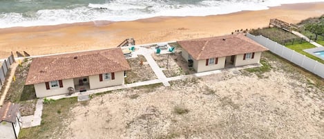 Aerial View of the Quarter Deck in Painter' Hill neighborhood of Flagler Beach, Florida (This listing is for the cottage on the left)