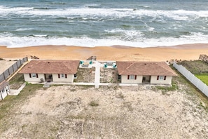 Aerial View of the Quarter Deck in Painter's Hill neighborhood of Flagler Beach, Florida (This listing is for the cottage on the LEFT).
