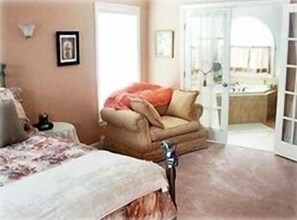 Spacious master bedroom with luxury bathroom, TV, DVD, VCR and stereo
