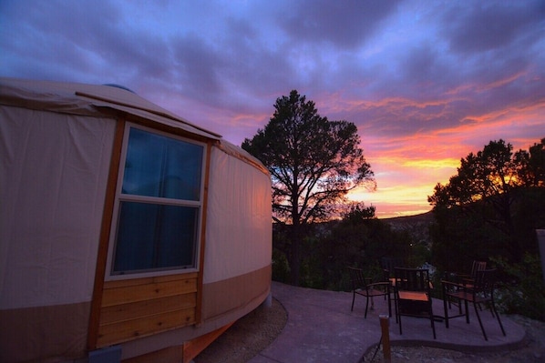 Yurt 9 sits right next to Yurt 10 on the second level of our hillside. It has beautiful views of the sunset in the evening and has a private, outdoor seating area with a gas firepit and BBQ.