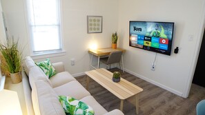 Relax and watch TV on 55" smart TV.  Live TV shown on Playstation VUE Service.