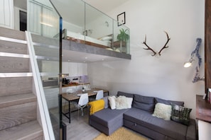 Modern open plan living space with mezzanine