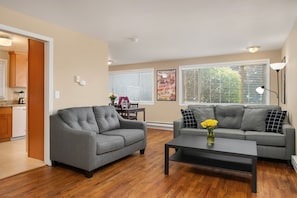 The open concept living area is light filled and airy