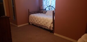 Upstairs den area with 2 trundle beds