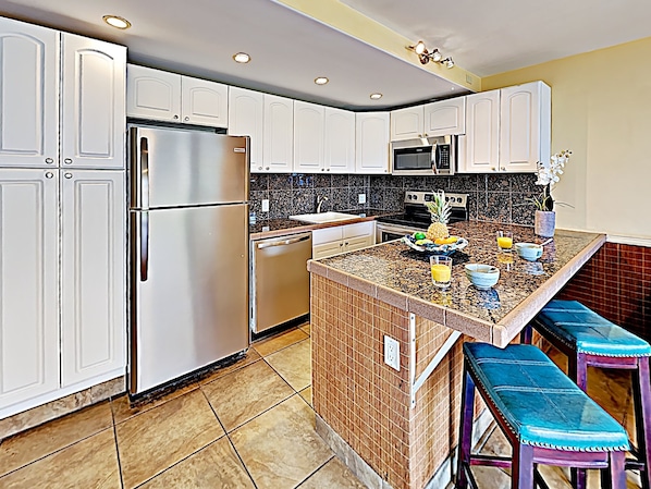 Kitchen - Beautifully remodeled kitchen with bar seating for two