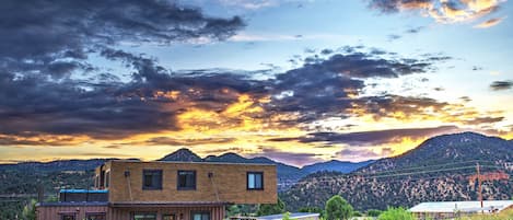 Picturesque sunset at Envase Casa with breathtaking views! 