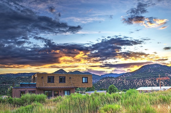 Picturesque sunset at Envase Casa with breathtaking views! 