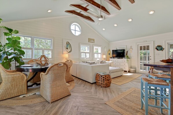 Open and airy dreamy cottage with soaring ceilings in living and dining!