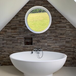 Relax, soaking in the bath with Noble Isle toiletries 