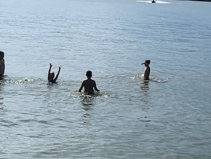 Kids playing in the lake