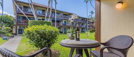 Relaxing lanai with partial ocean view.