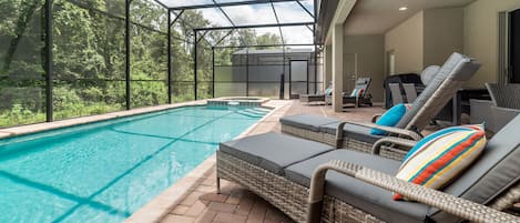 Enjoy our secluded, south-facing pool that backs a wooded conservation