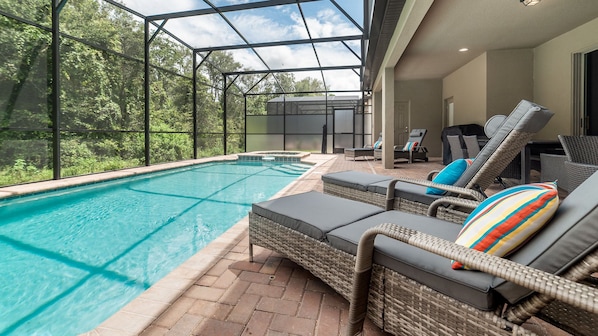 Enjoy our secluded, south-facing pool that backs a wooded conservation