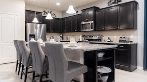 Cook in our state-of-the-art kitchen with stainless steel appliances