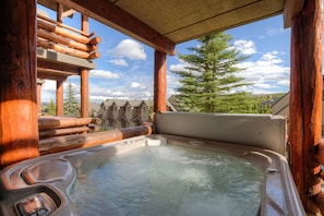 Image soaking those sore muscles and completely relaxing in the 5 person hot tub