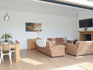 Bi-fold doors to attractive living areas | Manor Lodge Stables, Wiston, near Haverfordwest