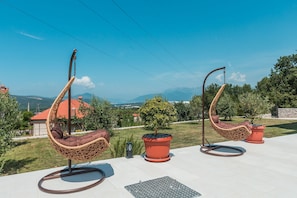 There are also swinging chars at the property
