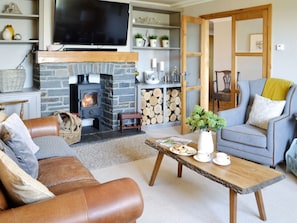 Welcoming living room | Maes Y Bryn Farmhouse, Llansadwrn, near Llandeilo