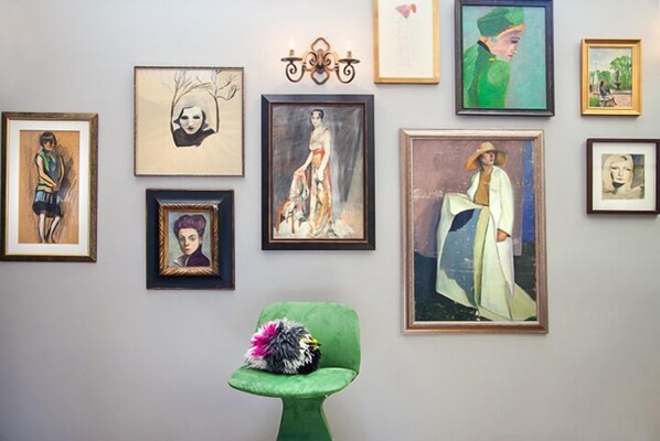 Welcome to Art House. Living room. Mix of vintage and modern artwork.