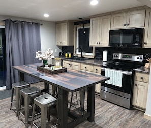  Updated Kitchen with all new cabinets and countertops.  