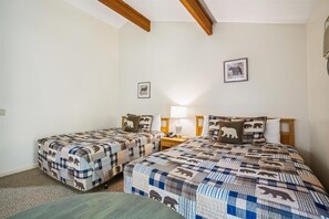 This bedroom offers 2 Queen beds.