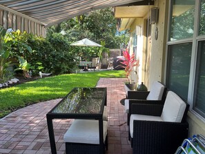 Patio and additional dining by grill!