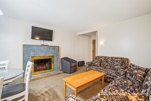 Get toasty and warm next to the electric fireplace.