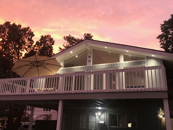 Furnished outdoor deck. There is NOT an umbrella on the deck area.