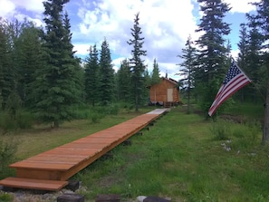 70' walkway leads you to your secluded getaway. Walkway if 4 feet wide with step