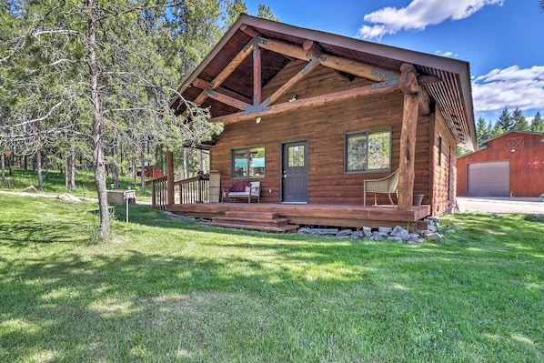 This 1-bedroom, 1-bath vacation rental cabin is nestled on a 40-acre ranch!